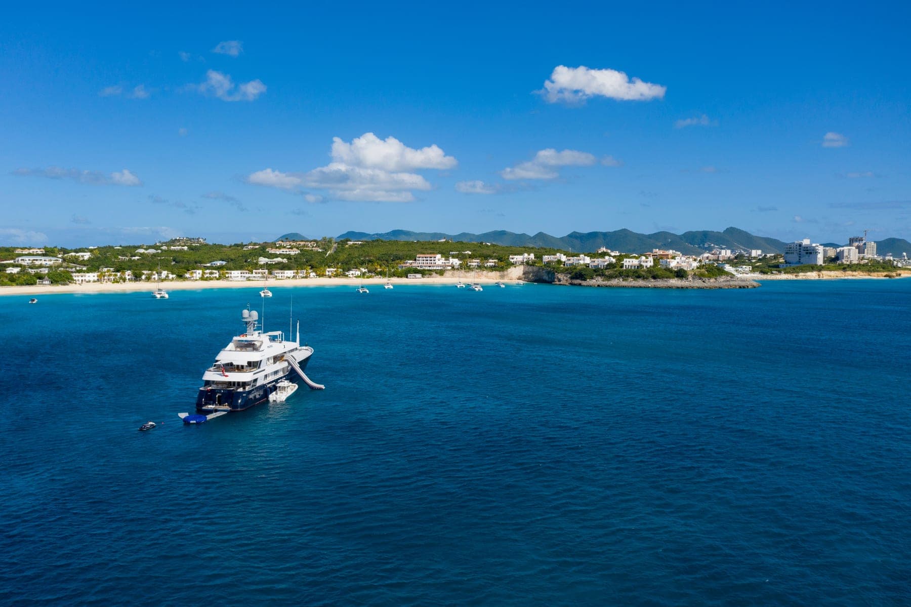 A megayacht anchored off a Sint Maarten beach